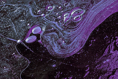 Frozen Bubble Clusters Among Twirling River Ice (Purple Tint)