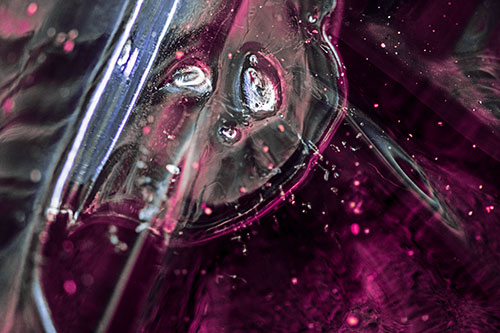 Frozen Unhappy Frowning Distorted River Ice Face (Purple Tint Photo)