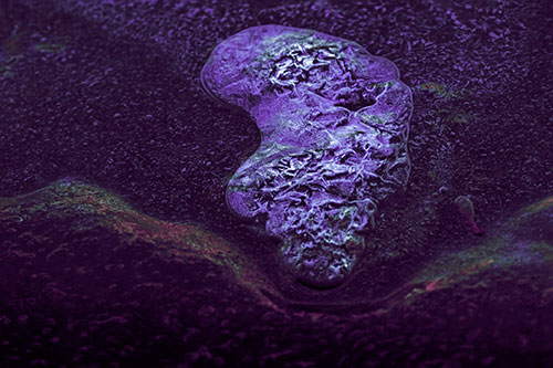 Frozen Water Bubble Mass Formation Along River (Purple Tint Photo)