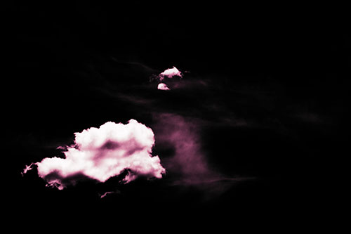 Isolated Creature Head Cloud Appears Within Darkness (Purple Tint Photo)