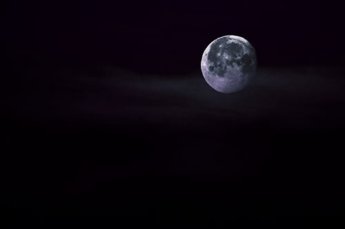 Moon Sets Behind Faint Clouds (Purple Tint Photo)