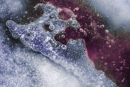 Screaming Submerged Bubble Face Creature Among Icy River (Purple Tint Photo)