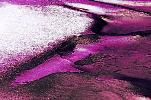 Sloping Ice Melting Atop River Water (Purple Tint Photo)