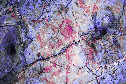Smirking Chaos Cracked Rock Face (Purple Tint)