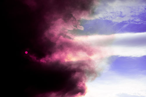 Sun Spiraling Out Of Mullen Fire Clouds (Purple Tint Photo)