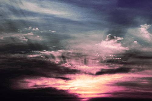 Sunrise Bursting Colorful Light Past Clouds (Purple Tint Photo)