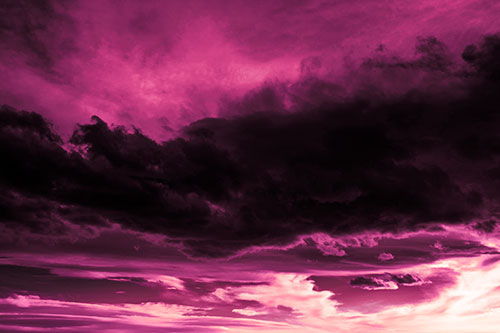 Sunset Producing Fire Orange Clouds (Purple Tint Photo)