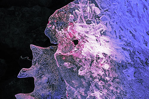 Two Faced Optical Illusion Ice Face Hanging Above River (Purple Tint)