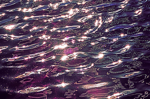 Water Ripples Sparkling Among Sunlight (Purple Tint Photo)
