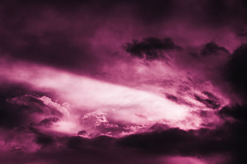 White Light Tearing Through Clouds (Purple Tint Photo)