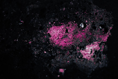 Wide Eyed Oil Demon Face Floating Atop Water (Purple Tint)