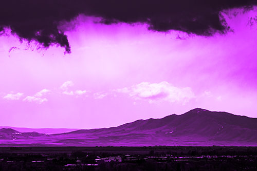 Dark Cloud Mass Above Mountain Range Horizon (Purple Tone Photo)