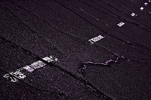 Decomposing Pavement Markings Along Sidewalk (Purple Tone Photo)