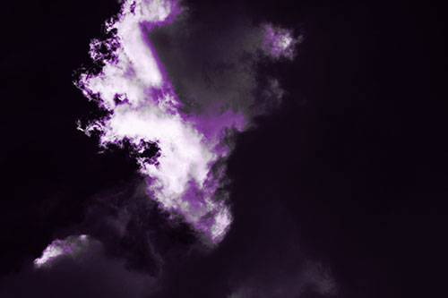 Evil Cloud Face Snarls Among Sky (Purple Tone Photo)