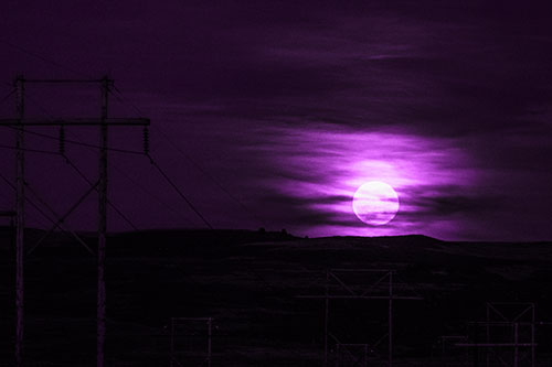 Full Moonrise Behind Mountain (Purple Tone Photo)