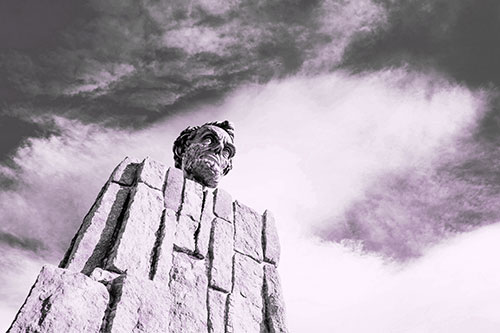 Presidents Statue Standing Tall Among Clouds (Purple Tone Photo)