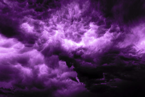 Raging Thunderstorm Clouds Brewing Among Sky (Purple Tone)