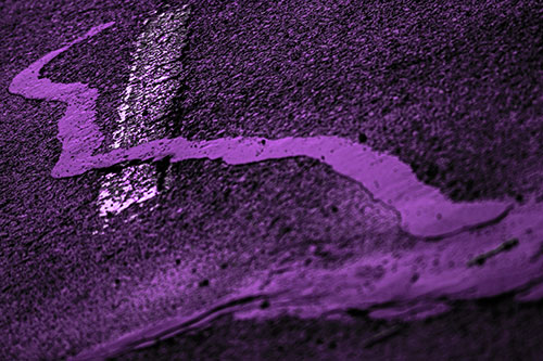 Slithering Tar Creeps Over Pavement Marking (Purple Tone Photo)
