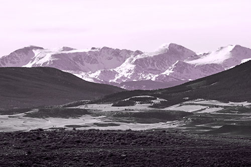 Snow Capped Mountains Behind Hills (Purple Tone Photo)