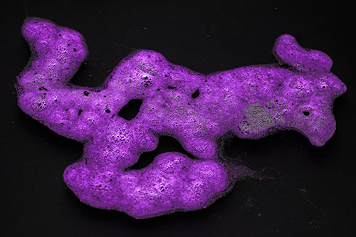 Sorrow Morphing Bubble Face Floating Above Soil (Purple Tone)