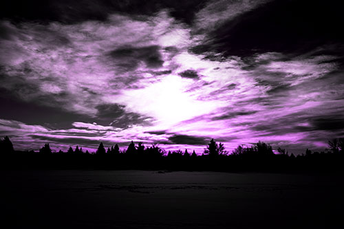 Sun Vortex Illuminates Clouds Above Dark Lit Lake (Purple Tone Photo)