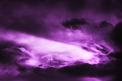 White Light Tearing Through Clouds (Purple Tone Photo)