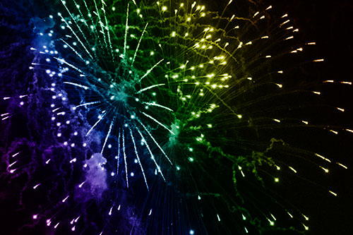 Multiple Firework Explosions Send Light Orbs Flying (Rainbow Shade Photo)