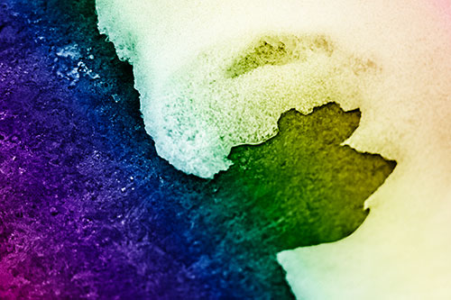 Screaming Snow Face Slowly Melting Atop Rock Surface (Rainbow Shade Photo)