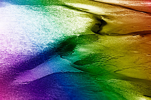 Sloping Ice Melting Atop River Water (Rainbow Shade Photo)