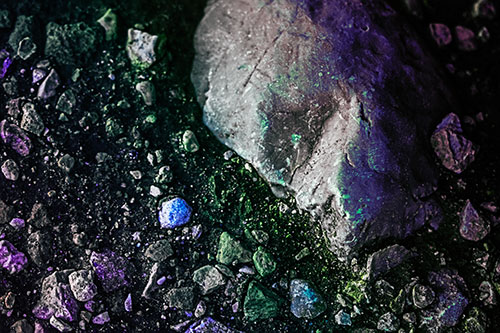 Alien Skull Rock Face Emerging Atop Dirt Surface (Rainbow Tint Photo)