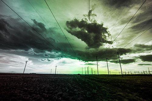 Creature Cloud Formation Above Powerlines (Rainbow Tint Photo)