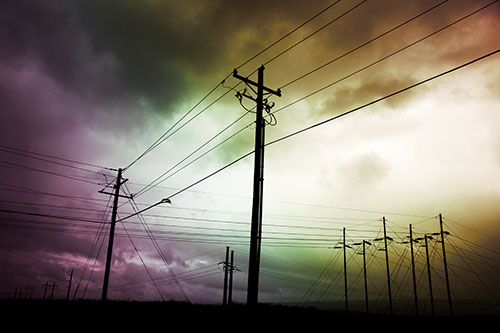 Crossing Powerlines Beneath Rainstorm (Rainbow Tint Photo)