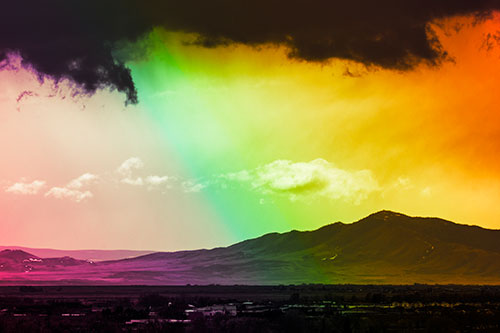 Dark Cloud Mass Above Mountain Range Horizon (Rainbow Tint Photo)