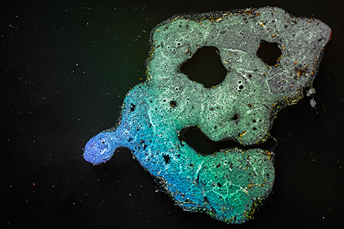 Droopy Smiling Bubble Face Floating Above Soil (Rainbow Tint)