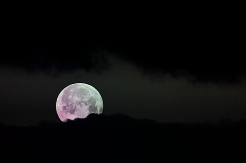 Easter Morning Moon Peeking Through Clouds (Rainbow Tint Photo)