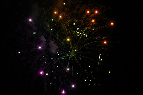Firework Light Orbs Free Falling After Explosion (Rainbow Tint Photo)
