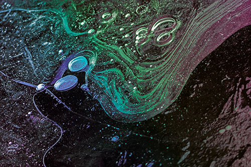 Frozen Bubble Clusters Among Twirling River Ice (Rainbow Tint Photo)