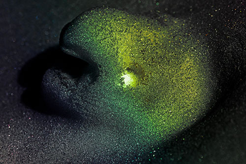 Glowing Eyed Snow Face Emerges Above Soil (Rainbow Tint)