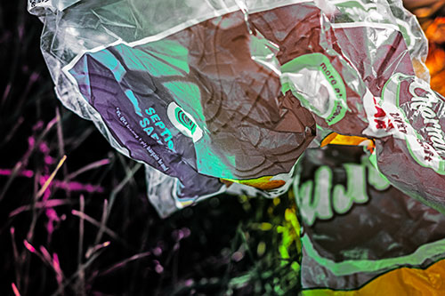 Growling Plastic Charmin Bag Among Grass (Rainbow Tint)
