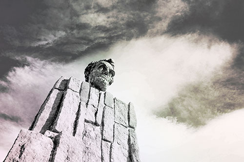 Presidents Statue Standing Tall Among Clouds (Rainbow Tint Photo)