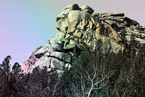 Rock Formations Rising Above Treeline (Rainbow Tint Photo)