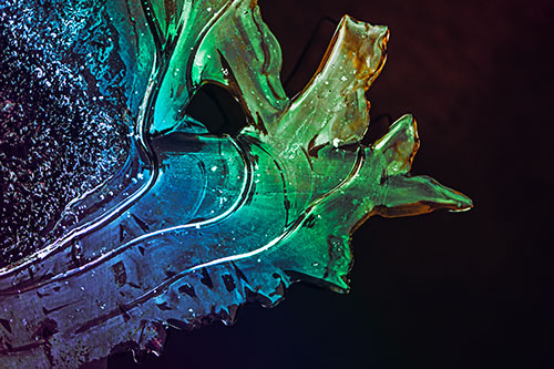 Smooth Ice Face Creature Hanging Above River Shoreline (Rainbow Tint)