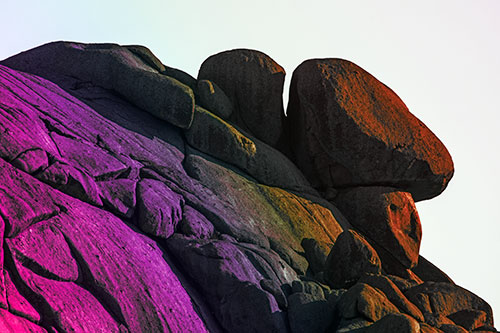 Sunlight Casting Shadows On Mountain Of Rocks (Rainbow Tint)