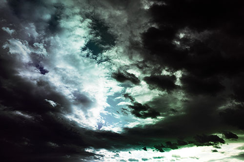 Thick Dark Cloud Refuses To Split In Half (Rainbow Tint Photo)