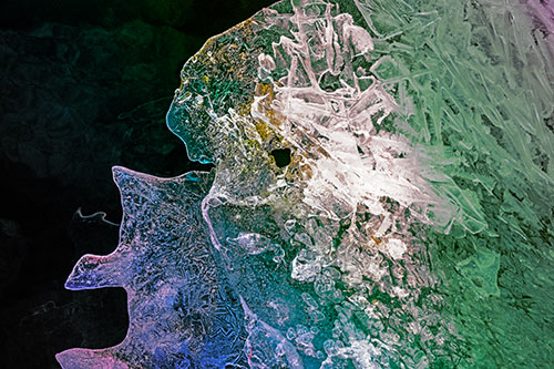 Two Faced Optical Illusion Ice Face Hanging Above River (Rainbow Tint Photo)