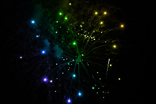 Firework Light Orbs Free Falling After Explosion (Rainbow Tone Photo)