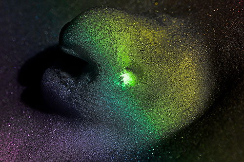 Glowing Eyed Snow Face Emerges Above Soil (Rainbow Tone)