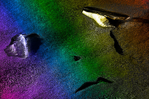 Sad Teardrop Ice Face Appears Atop Frozen River (Rainbow Tone Photo)