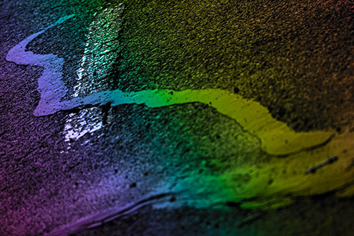 Slithering Tar Creeps Over Pavement Marking (Rainbow Tone Photo)