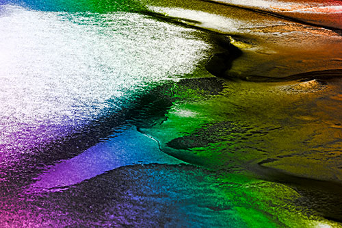 Sloping Ice Melting Atop River Water (Rainbow Tone Photo)